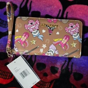 Betsey Johnson Brown Wristlet with Cowboy Design